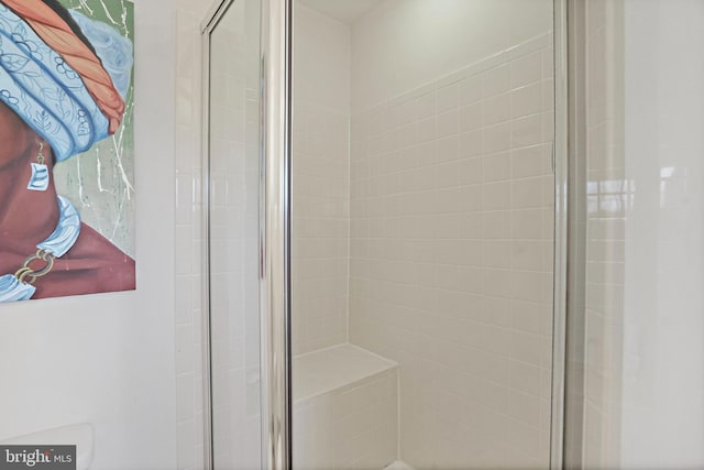 bathroom with an enclosed shower