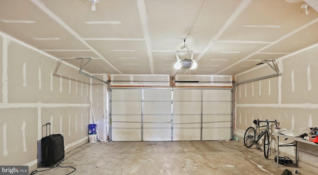 garage featuring a garage door opener