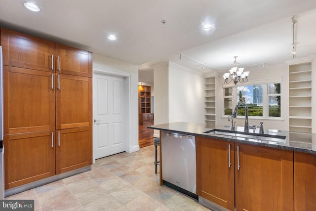 kitchen with sink, dishwasher, an inviting chandelier, hanging light fixtures, and dark stone counters