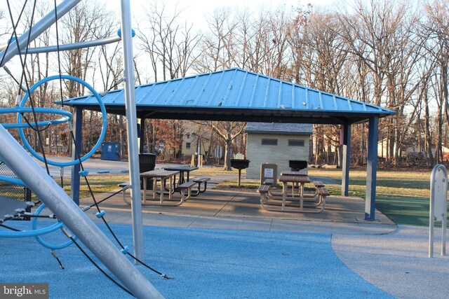 view of property's community featuring playground community