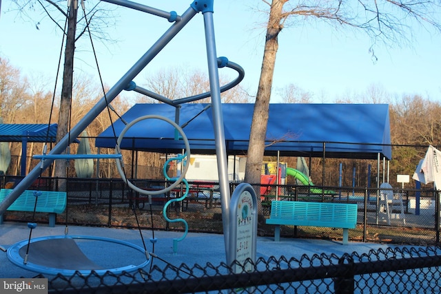 community playground featuring fence