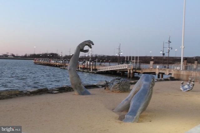 view of dock with a water view