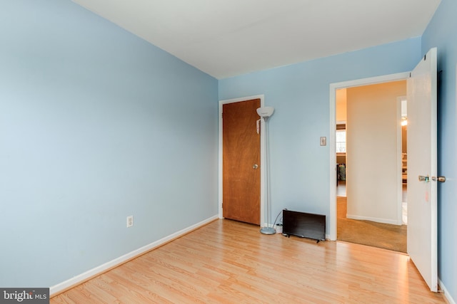 unfurnished bedroom featuring light hardwood / wood-style floors