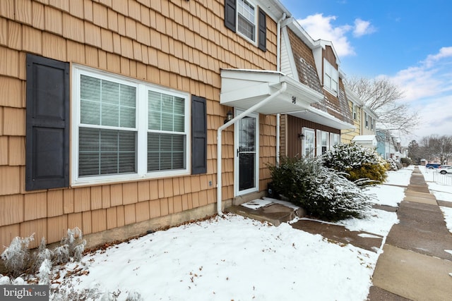 view of snow covered property