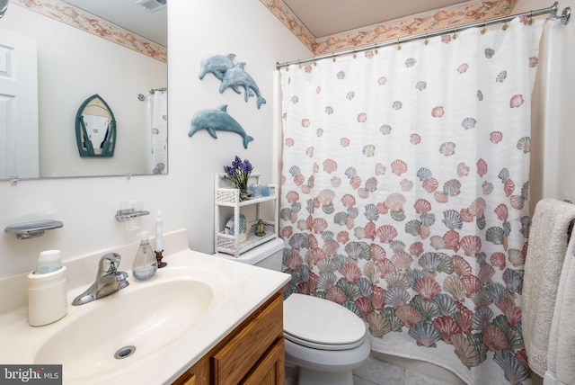 full bathroom featuring visible vents, a shower with shower curtain, vanity, and toilet