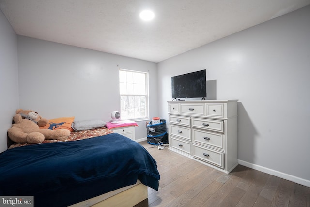 bedroom featuring light hardwood / wood-style floors