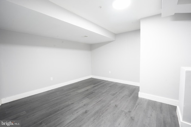 basement featuring hardwood / wood-style flooring