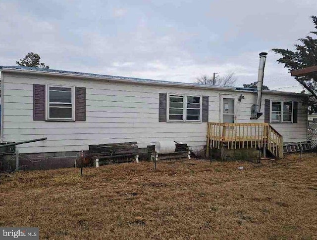 view of front of home with a front yard