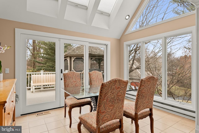 sunroom / solarium with lofted ceiling and visible vents