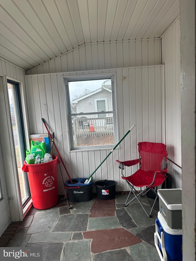 sunroom with vaulted ceiling