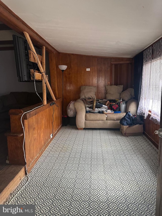 living room featuring wooden walls