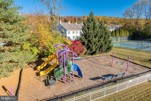 view of playground featuring tennis court