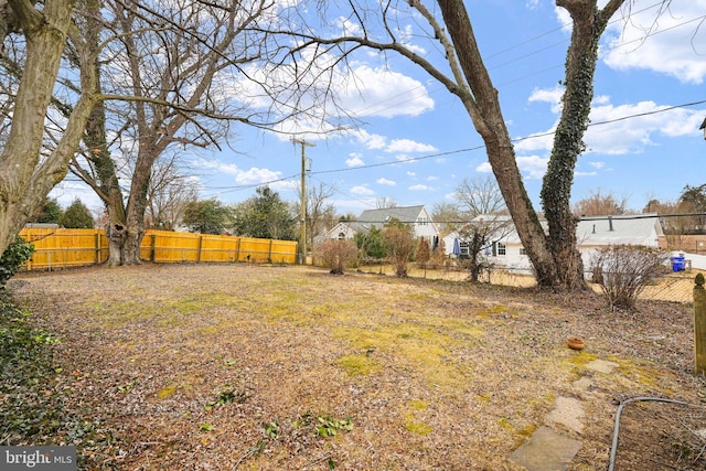 view of yard featuring a fenced backyard