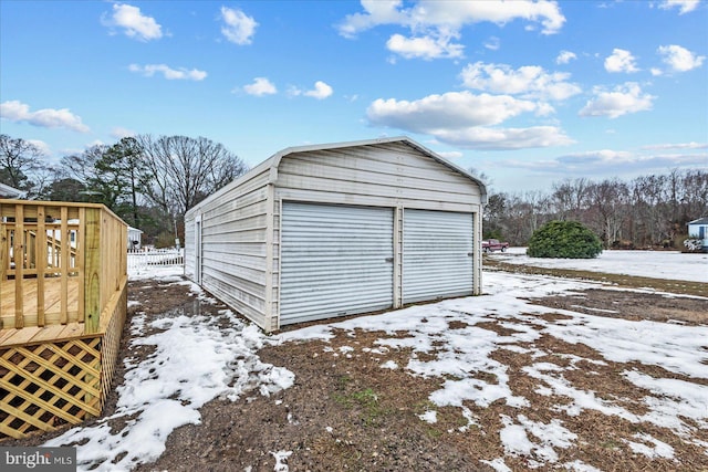 view of snow covered garage