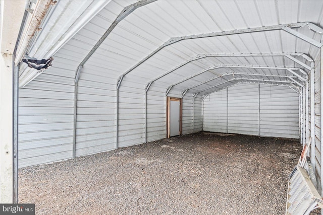 exterior space with a carport