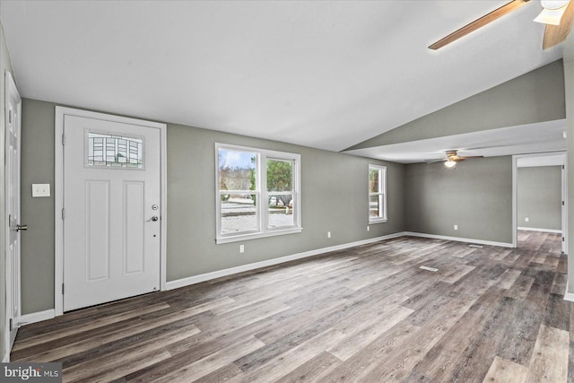 entryway featuring hardwood / wood-style flooring, lofted ceiling, and ceiling fan