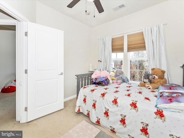 bedroom featuring ceiling fan and light colored carpet