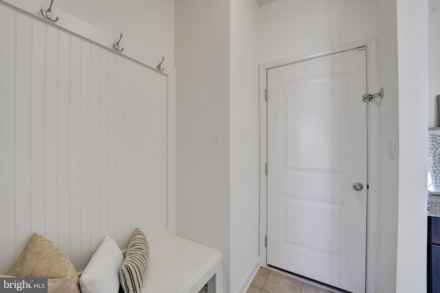 mudroom featuring light tile patterned floors