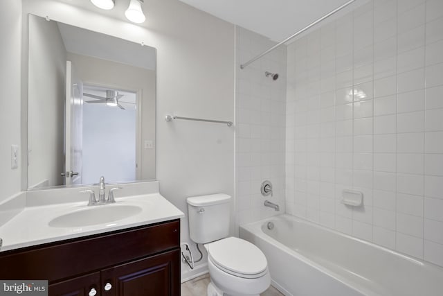 full bath with toilet, vanity, and shower / tub combination