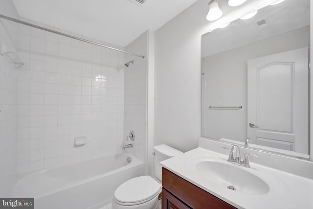 full bath with toilet, bathing tub / shower combination, vanity, and visible vents