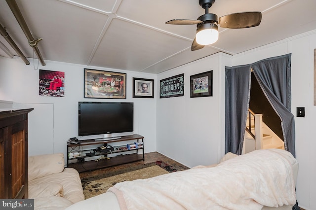 living area with ceiling fan