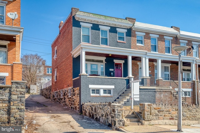 multi unit property featuring brick siding