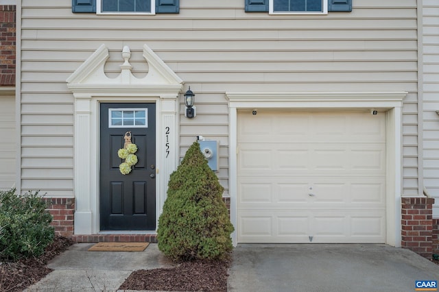 entrance to property with a garage