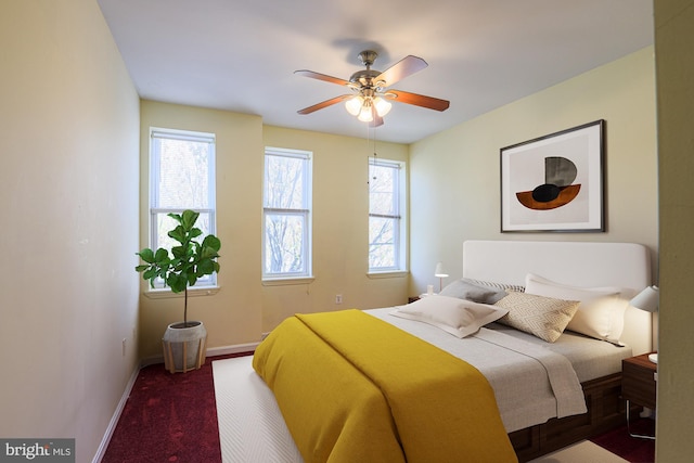 bedroom featuring ceiling fan and carpet floors