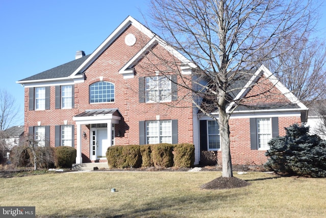 view of front of property with a front yard