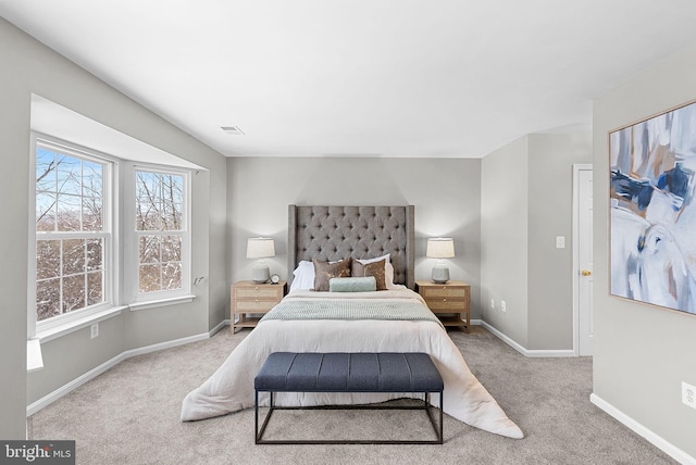 bedroom with light carpet