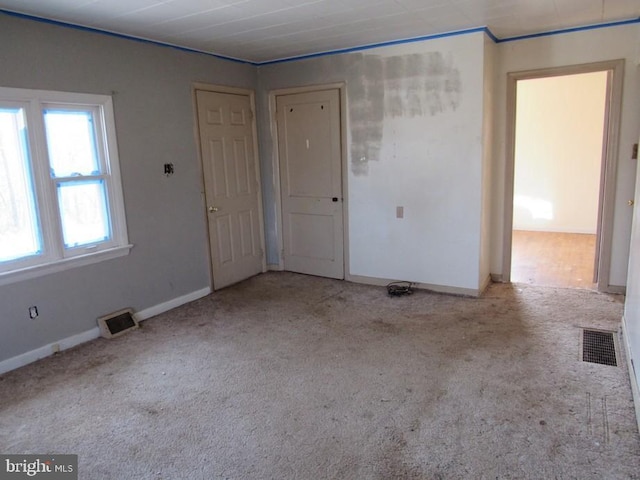 empty room with light carpet