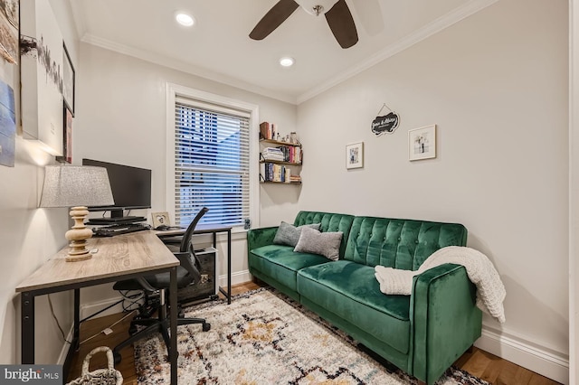 office space with crown molding, ceiling fan, and hardwood / wood-style flooring