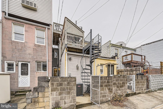 view of front of property featuring central AC unit