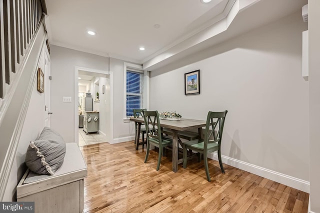 dining room with light hardwood / wood-style flooring