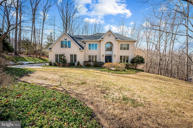 view of front of home with a front lawn