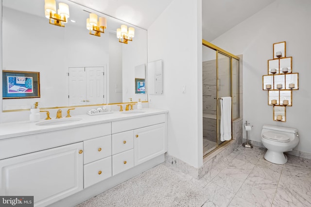 bathroom featuring toilet, a sink, marble finish floor, double vanity, and a stall shower