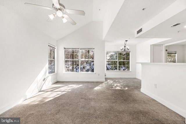 unfurnished living room featuring lofted ceiling, carpet floors, visible vents, and baseboards