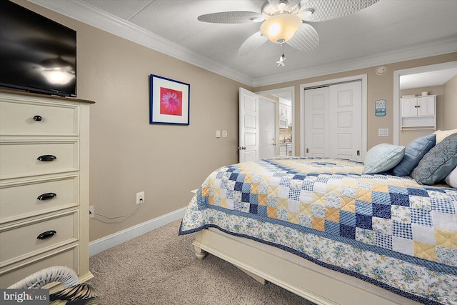 carpeted bedroom with crown molding, ceiling fan, and a closet