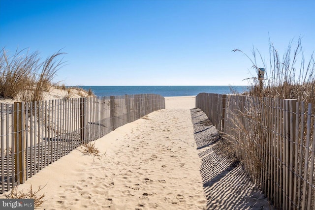 view of water feature with a beach view