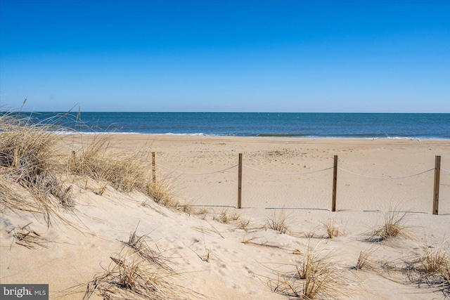 view of water feature with a beach view