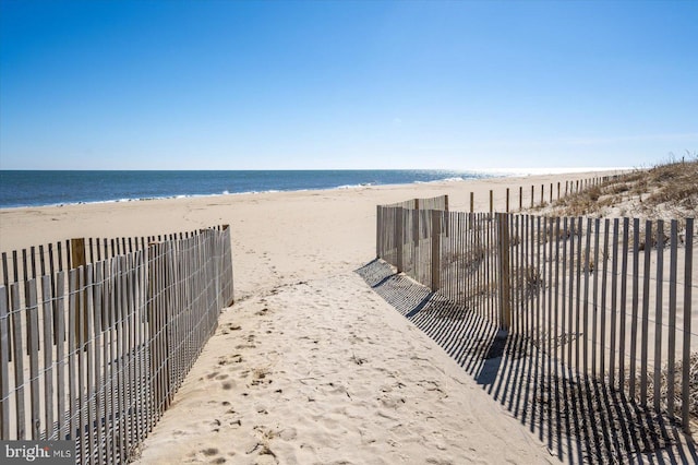 view of water feature featuring a beach view