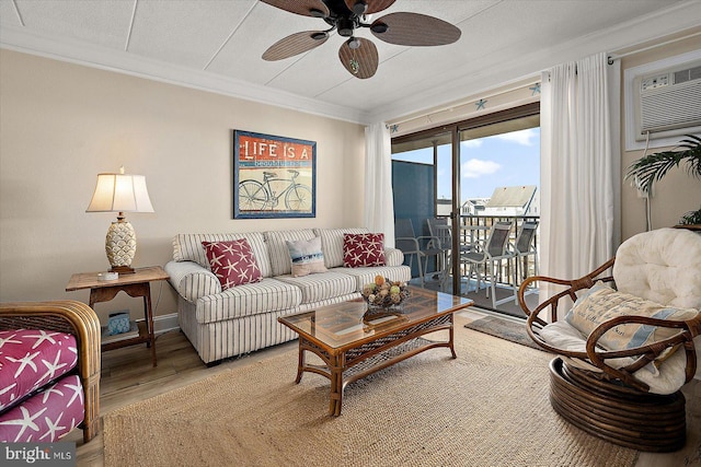 living room featuring crown molding, a textured ceiling, ceiling fan, and hardwood / wood-style flooring