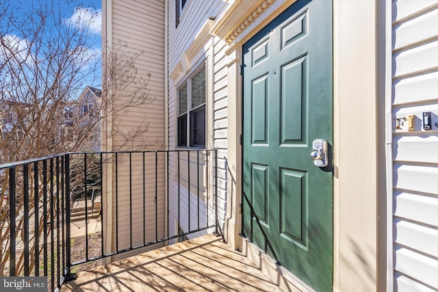 doorway to property with a balcony