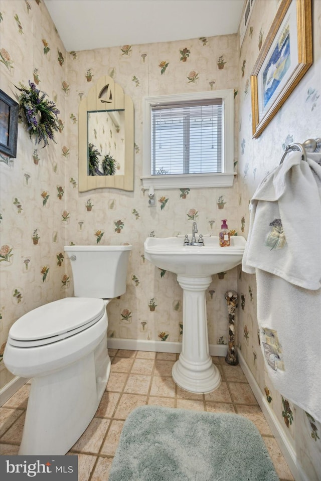 bathroom featuring toilet