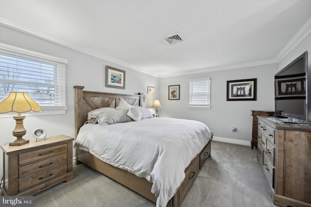 carpeted bedroom featuring ornamental molding