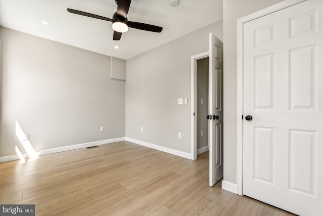 unfurnished bedroom featuring ceiling fan and light hardwood / wood-style floors