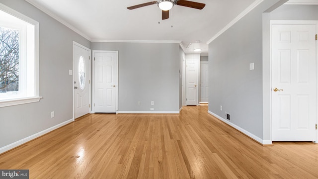 unfurnished living room featuring ceiling fan, ornamental molding, and light hardwood / wood-style flooring