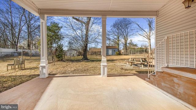 view of patio featuring an outdoor structure