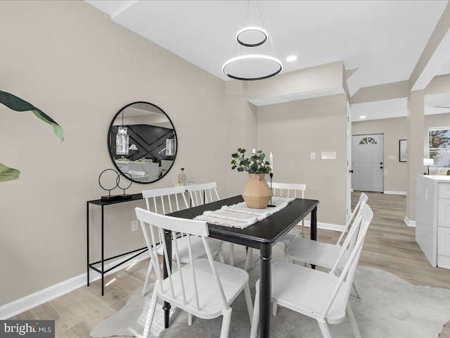 dining room with light hardwood / wood-style flooring