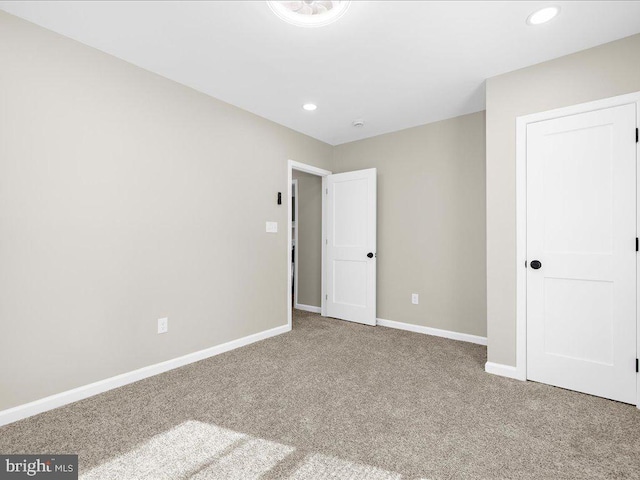 unfurnished bedroom featuring carpet floors